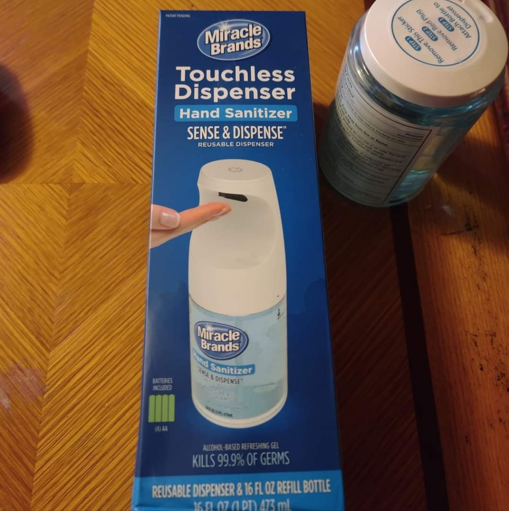 Hand sanitizer dispenser